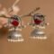 Raw Cherry Red Antique Silver Plated Charm Jhumka | Nature Inspired Collection