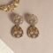 Saffron Meadow Vanmayi Antique Silver Plated Drop Earrings | Silver Electroplated Danglers