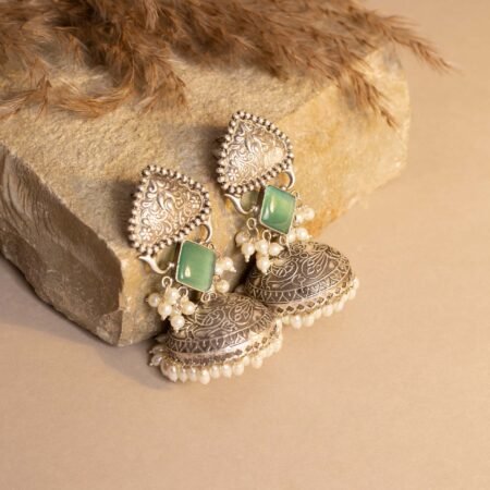 Diwan-e-Khas Antique Silver Plated Regal Jhumka with Soft Glow Seafoam Monalisa Stone