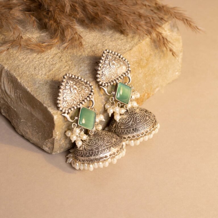 Diwan-e-Khas Antique Silver Plated Regal Jhumka with Soft Glow Seafoam Monalisa Stone