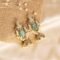 Mint Elegance Gold-Plated Pearl Fringe Jhumkas