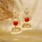 Ruby Red Tejomaya Gold Jhumka